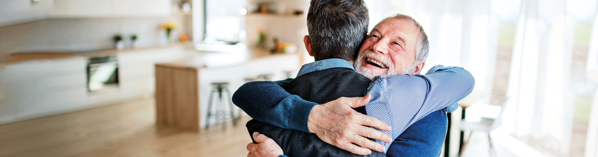 Clinical Genomics, father and son embrace, blood cancer